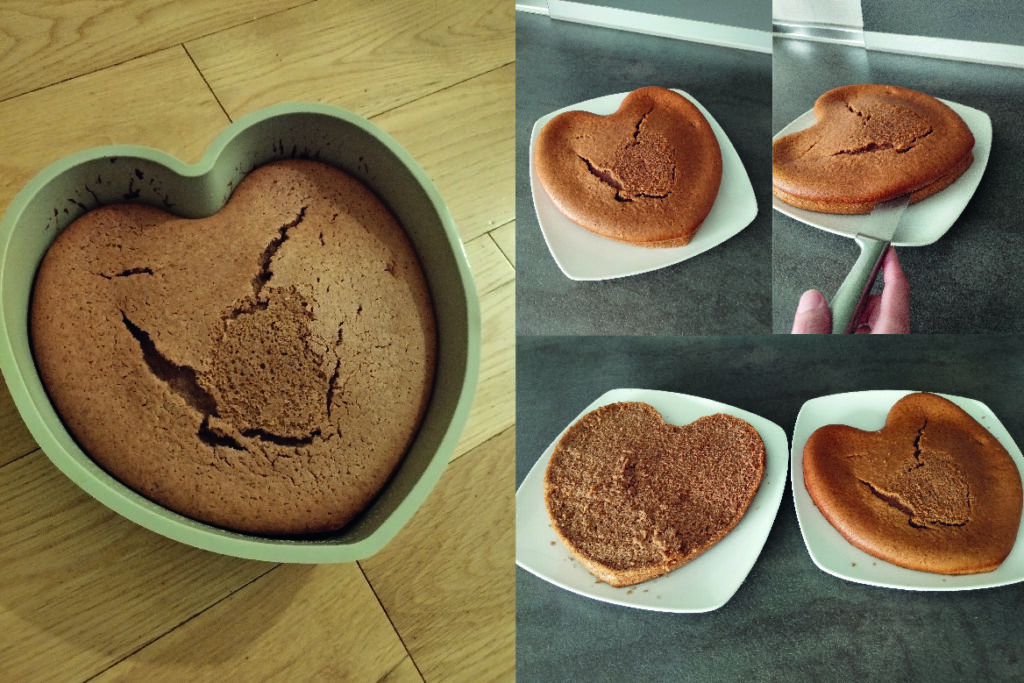 Bizcocho de chocolate en forma de corazón recién horneado dentro de un molde de silicona, con una textura dorada y algunas grietas en la superficie.